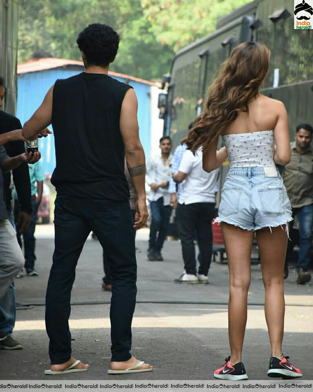 Disha Patani showing cleavage in Tube top and thighs in sexy shorts