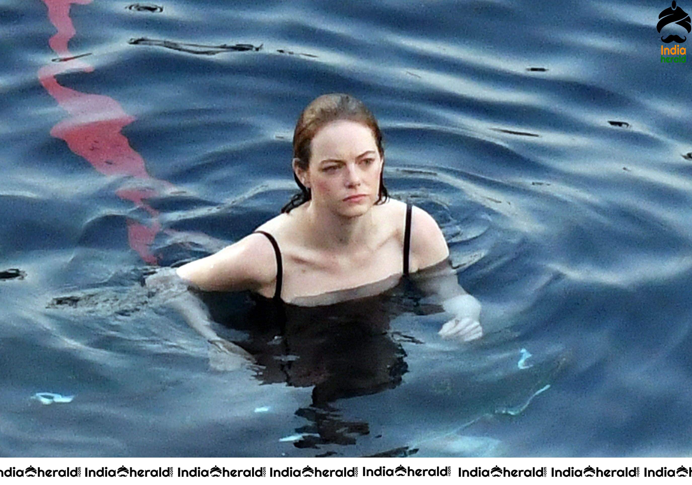 Emma Stone in Single Piece Bikini shooting an advertisement for Louis Vuitton Set 2