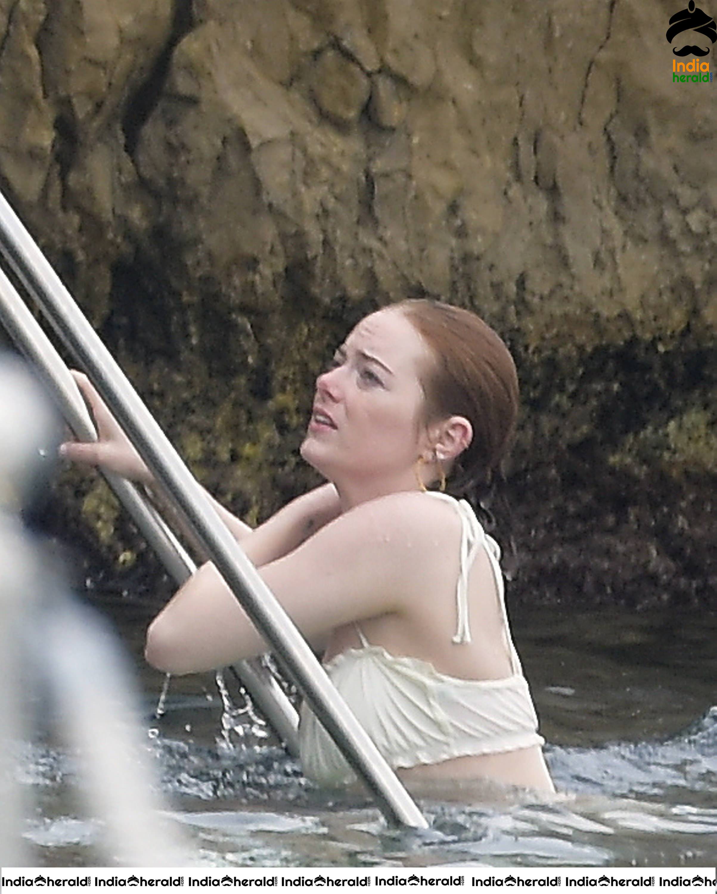 Emma Stone Wearing a Bikini in France