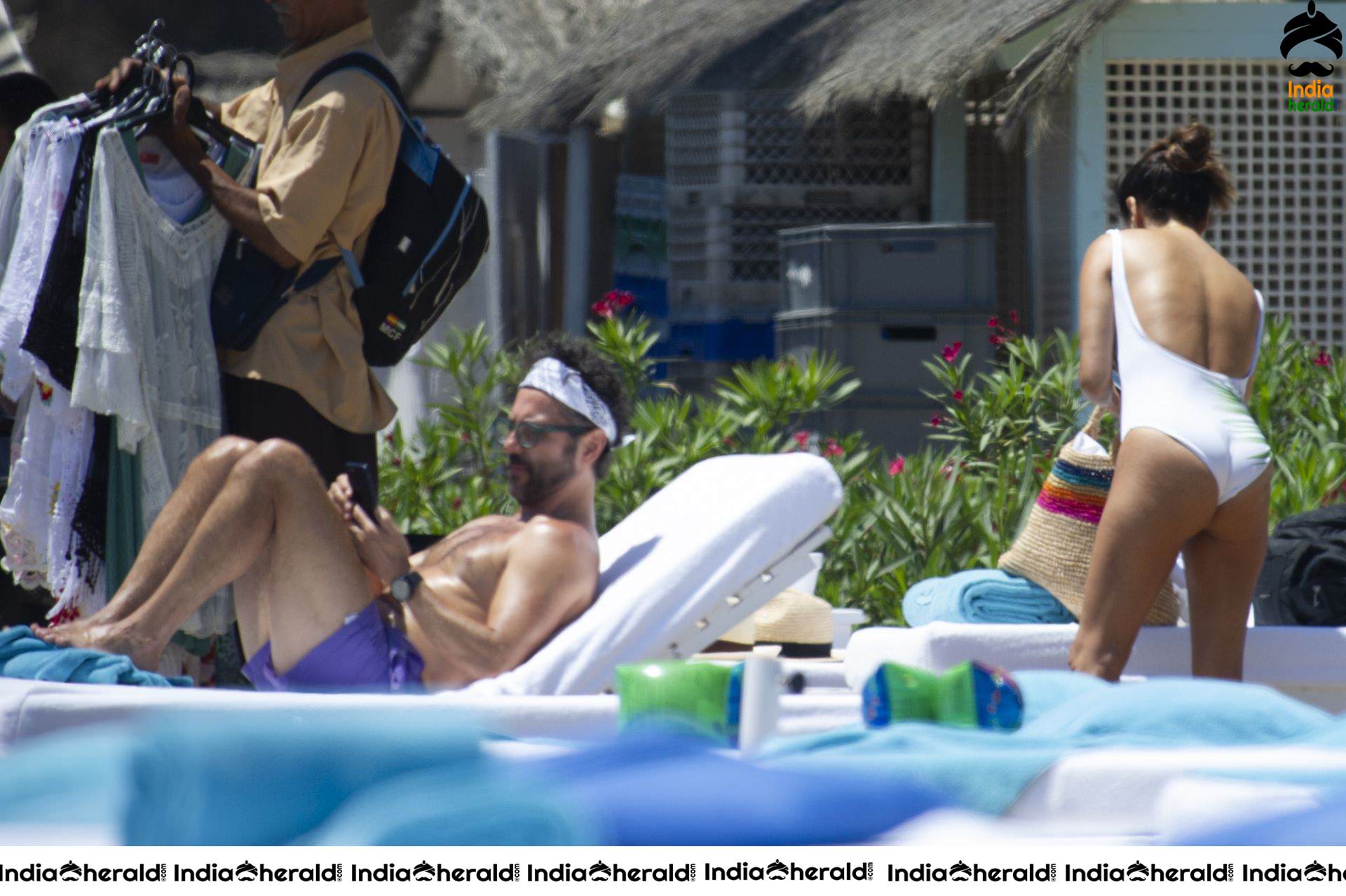 Eva Longoria in Single piece Bikini and out again in Marbella