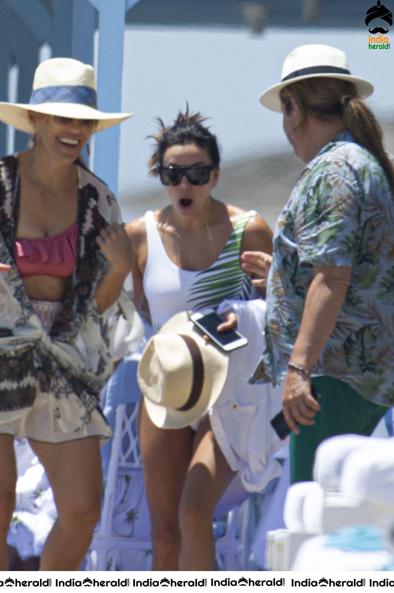 Eva Longoria in Single piece Bikini and out again in Marbella