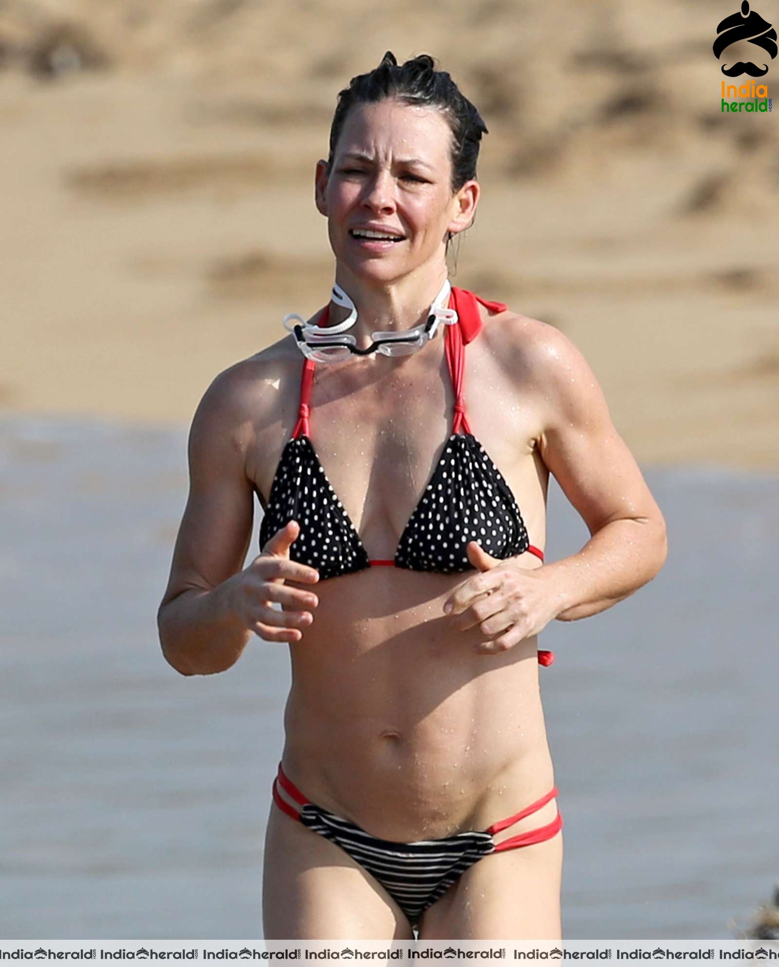 Evangeline Lilly in Bikini at a beach in Hawaii Set 2