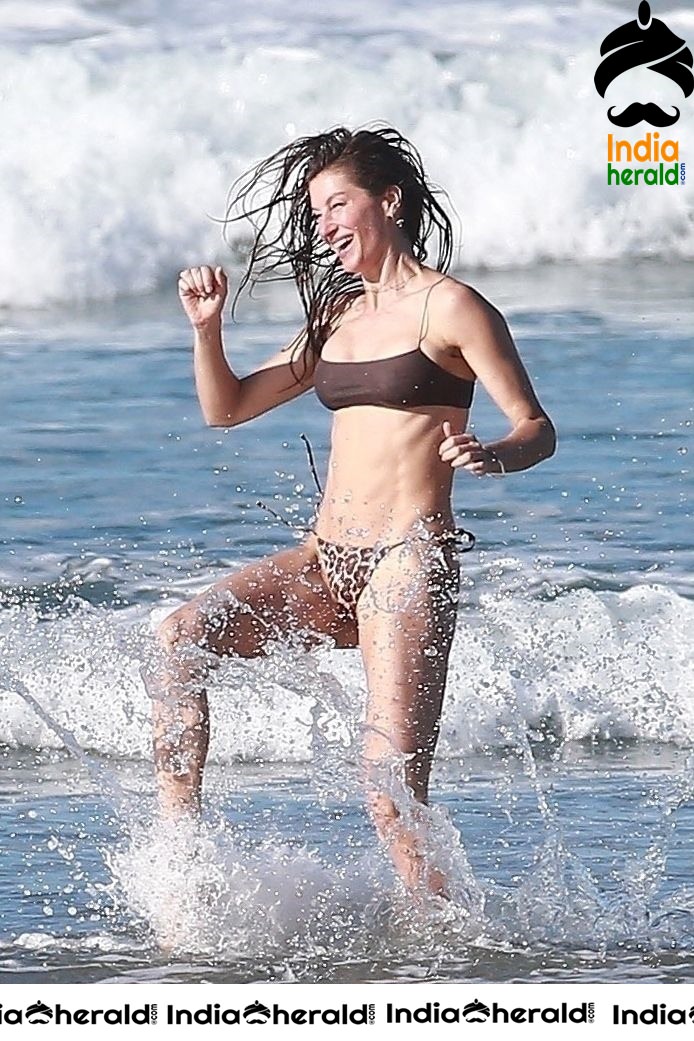 Gisele Bundchen during a Bikini photo shoot on the beach in Costa Rica Set 1