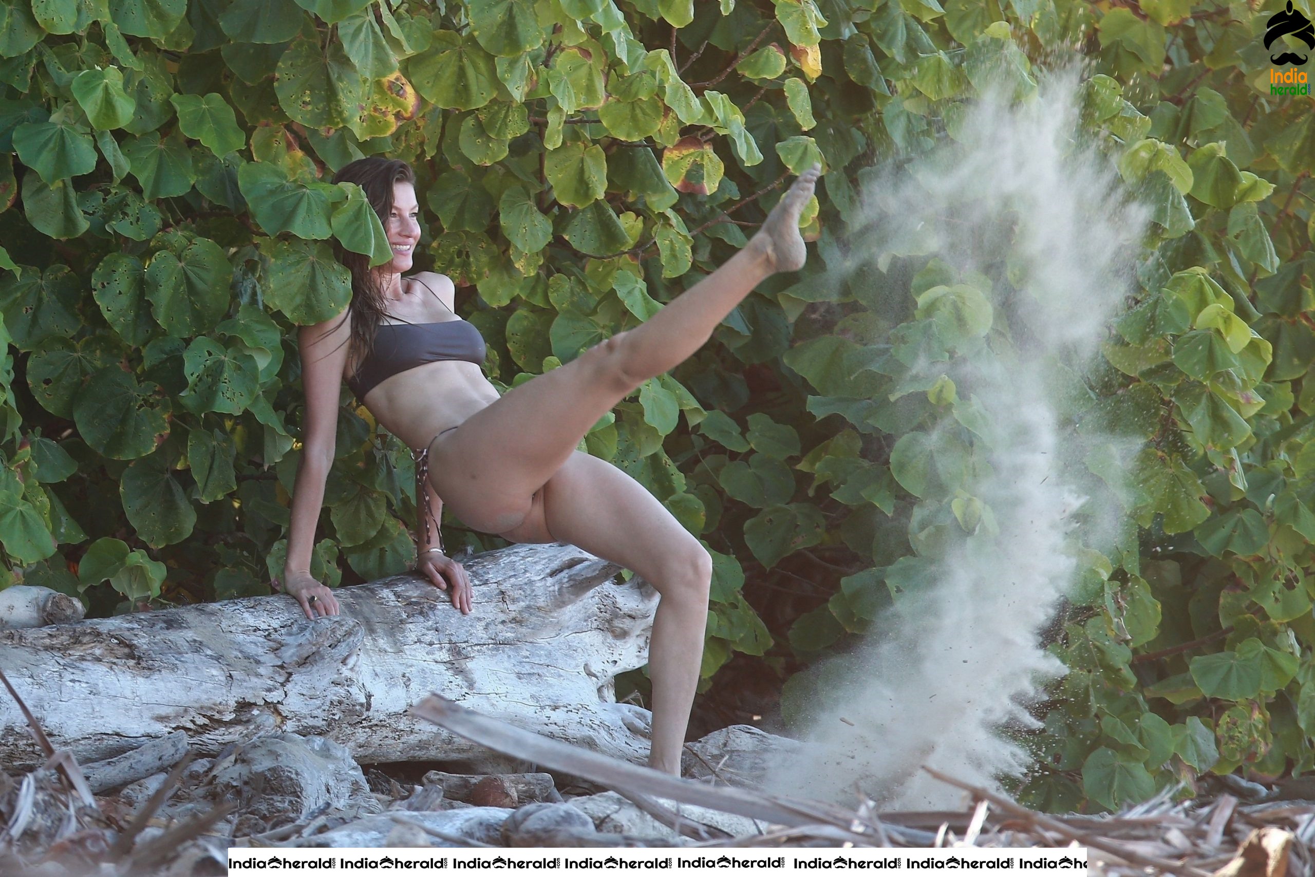 Gisele Bundchen during a Bikini photo shoot on the beach in Costa Rica Set 1
