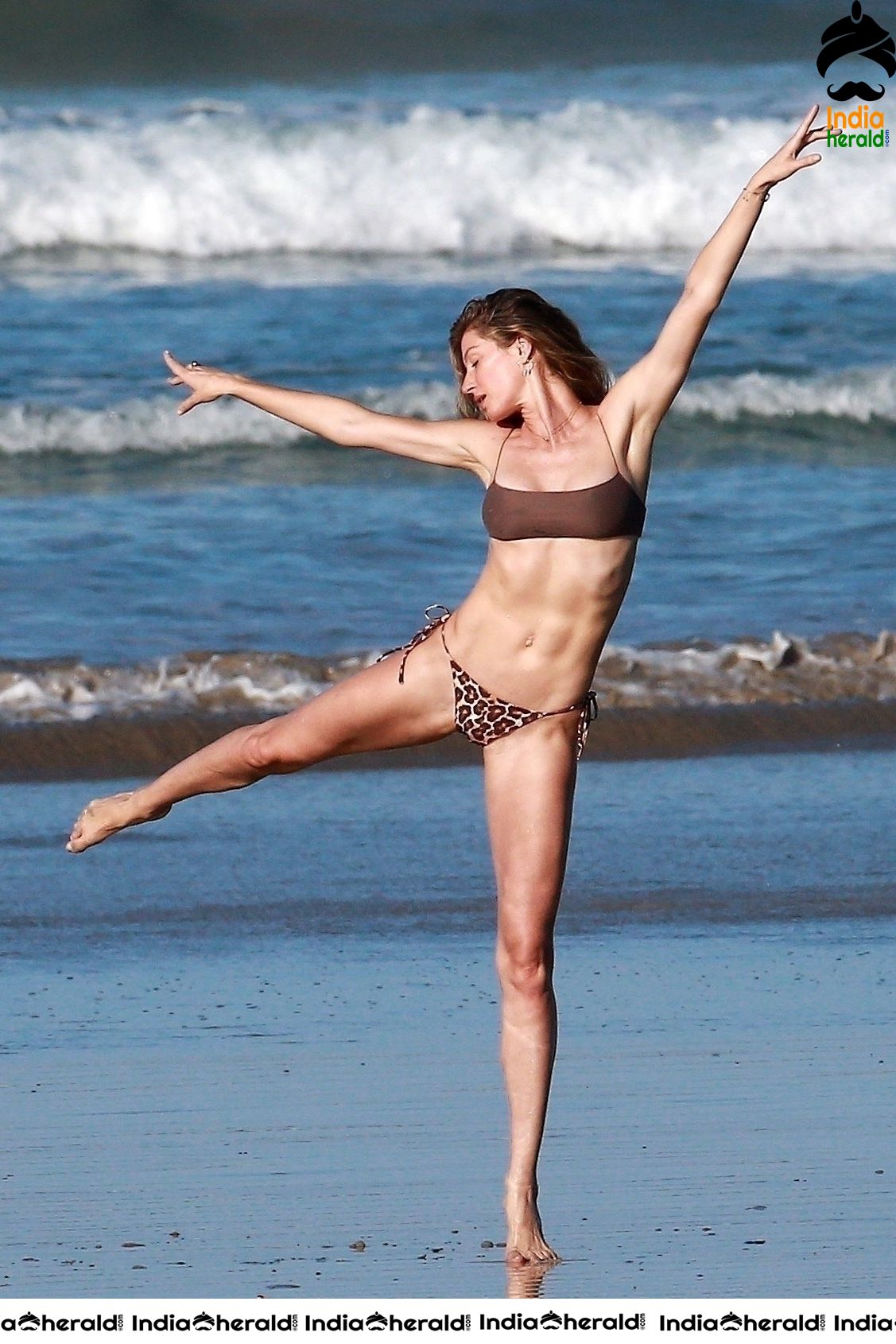 Gisele Bundchen during a Bikini photo shoot on the beach in Costa Rica Set 1