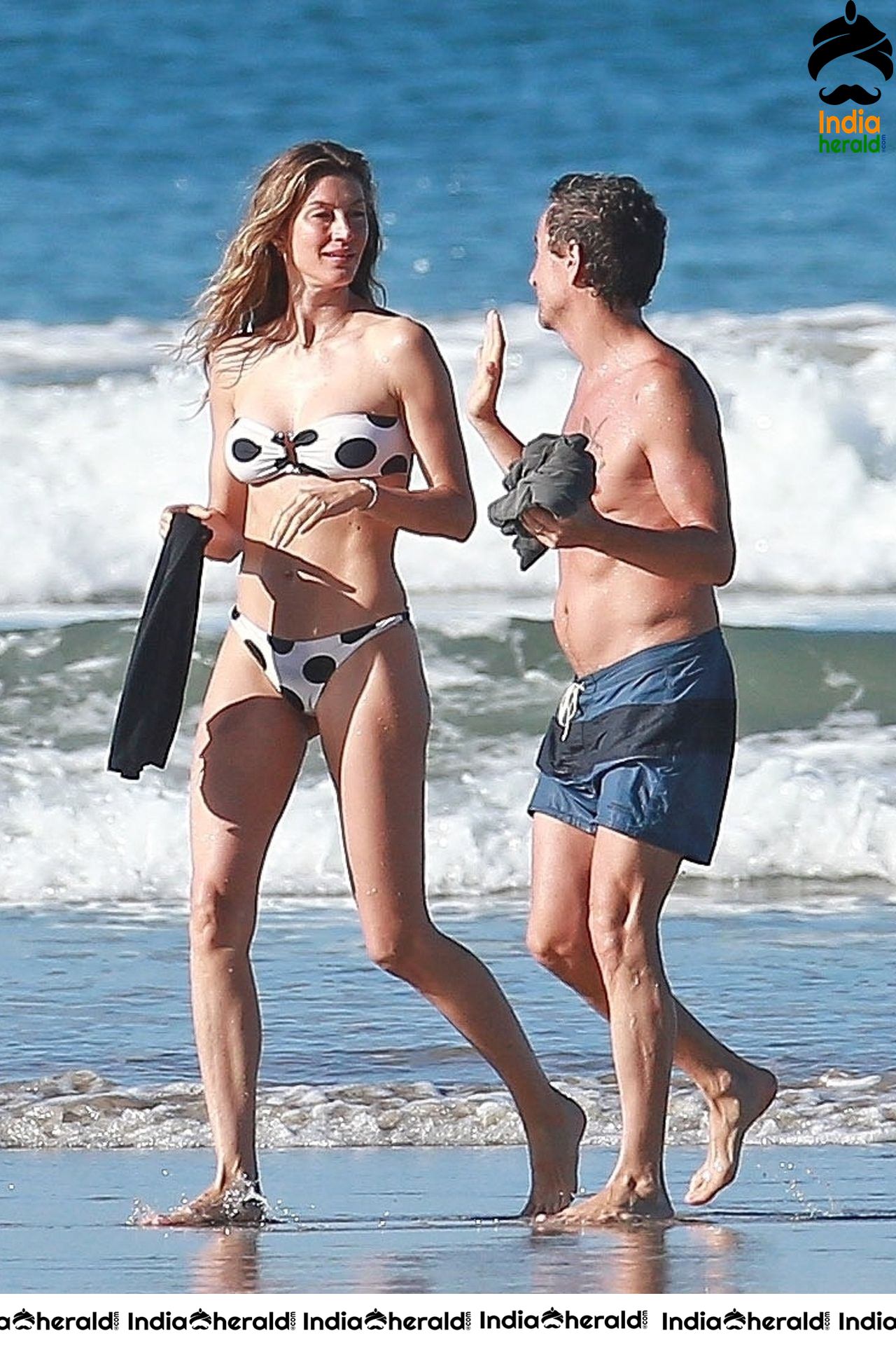 Gisele Bundchen Wearing Polka Dot Bikini White vacationing in Costa Rica