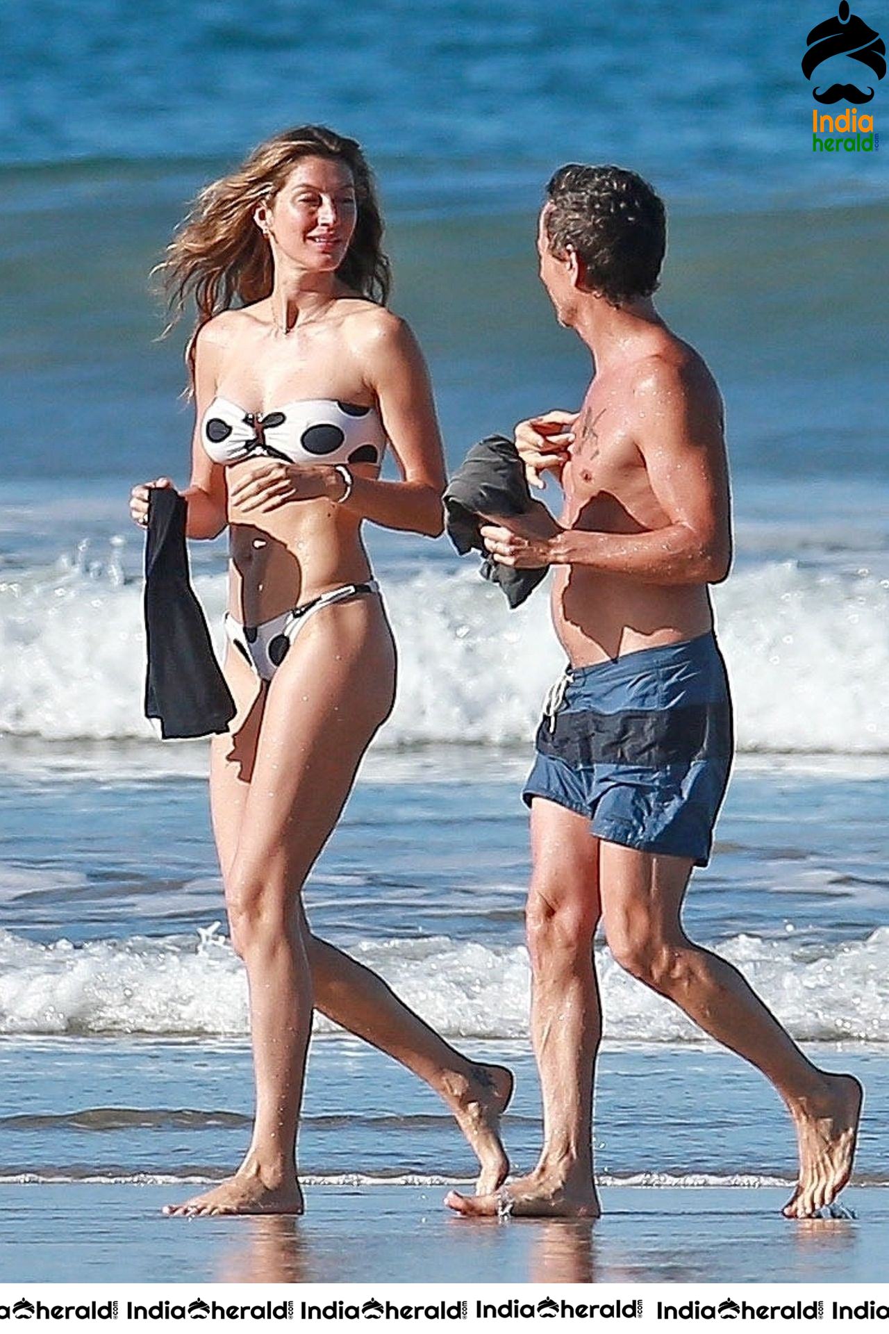 Gisele Bundchen Wearing Polka Dot Bikini White vacationing in Costa Rica