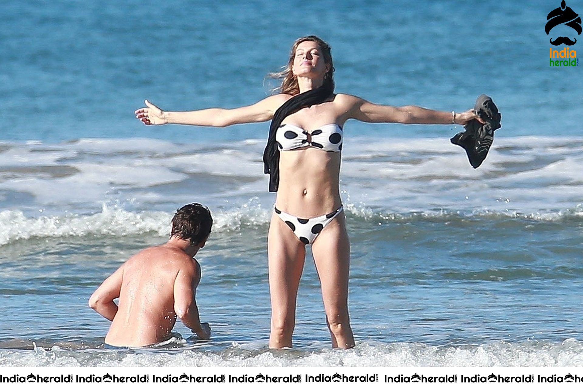 Gisele Bundchen Wearing Polka Dot Bikini White vacationing in Costa Rica