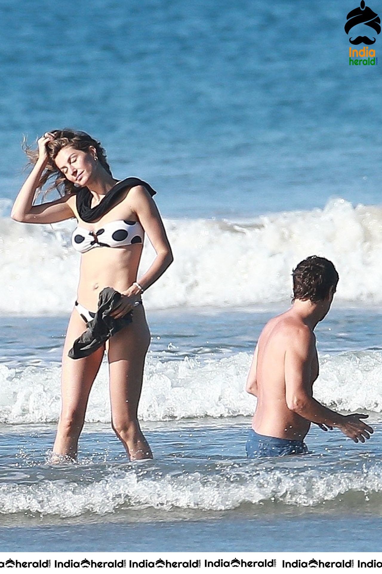 Gisele Bundchen Wearing Polka Dot Bikini White vacationing in Costa Rica