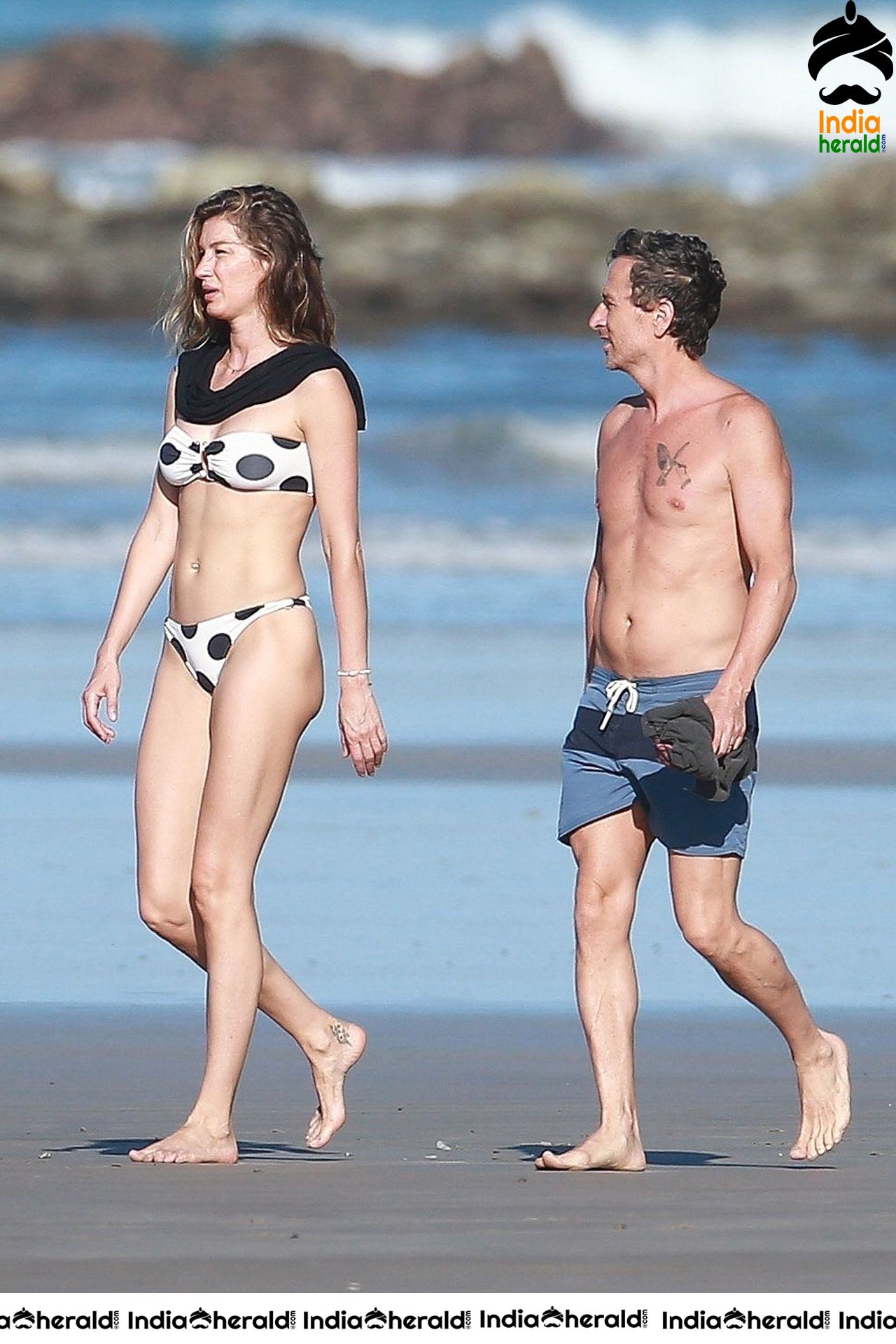 Gisele Bundchen Wearing Polka Dot Bikini White vacationing in Costa Rica