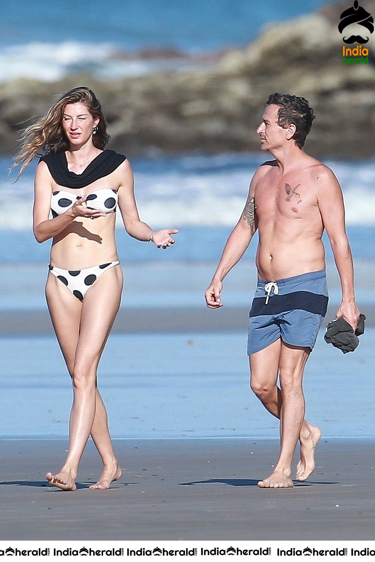 Gisele Bundchen Wearing Polka Dot Bikini White vacationing in Costa Rica