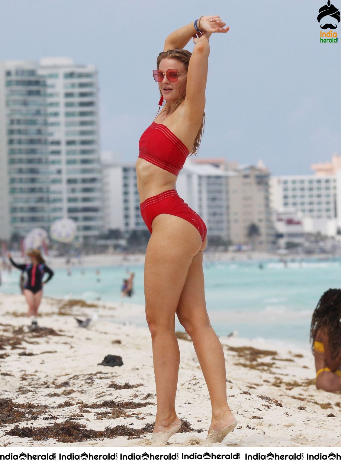 Grace Levy in a two piece red bikini while in Tulum Mexico