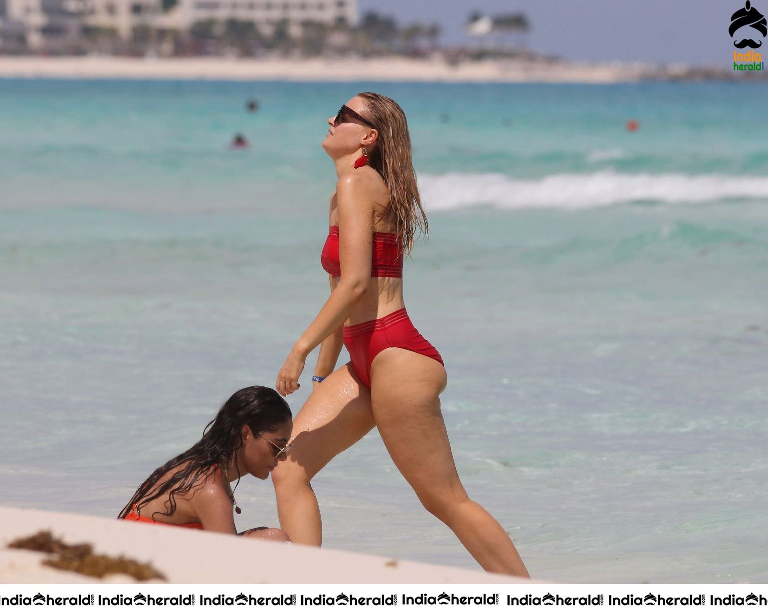 Grace Levy in a two piece red bikini while in Tulum Mexico