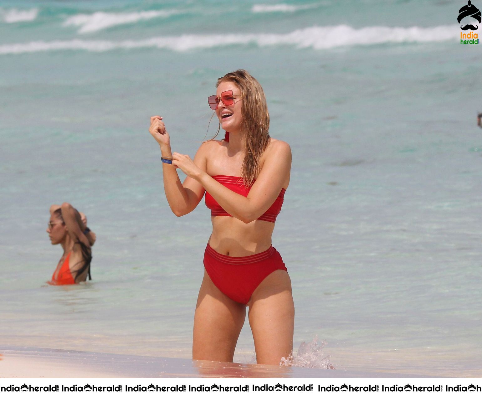 Grace Levy in a two piece red bikini while in Tulum Mexico