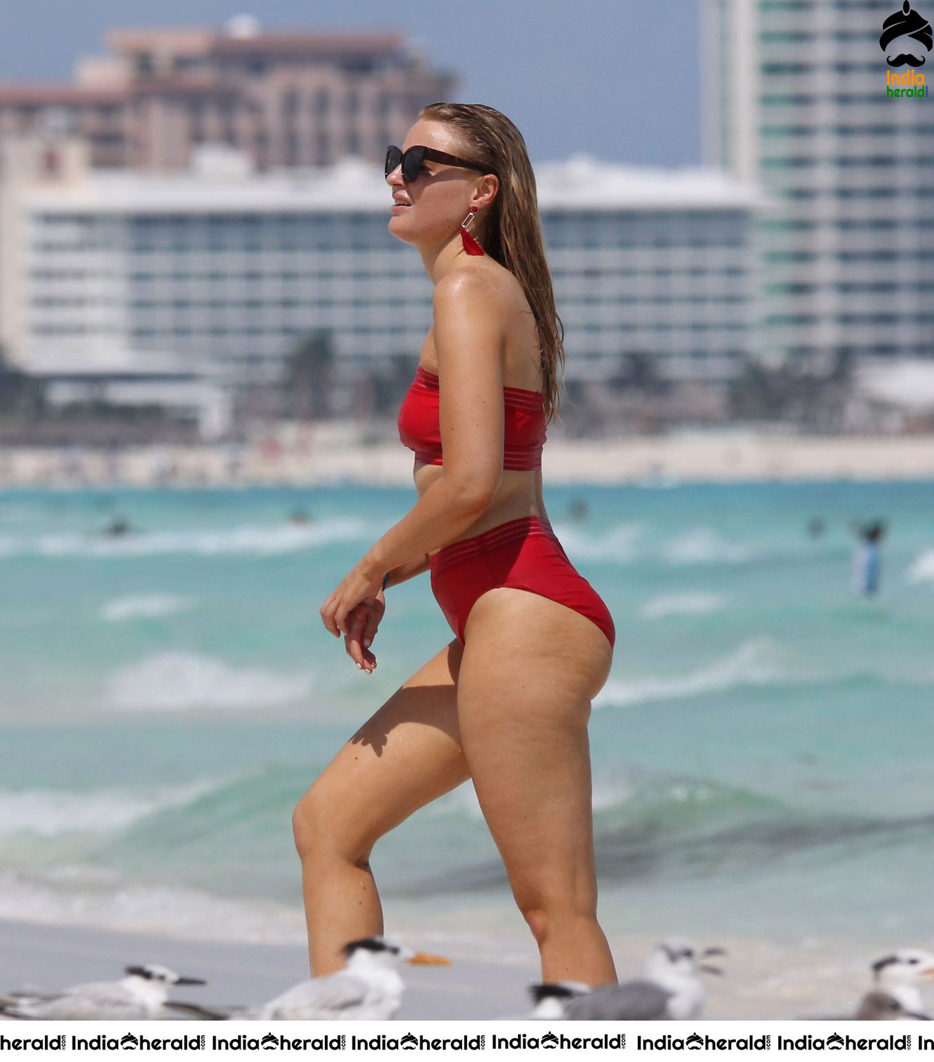 Grace Levy in a two piece red bikini while in Tulum Mexico