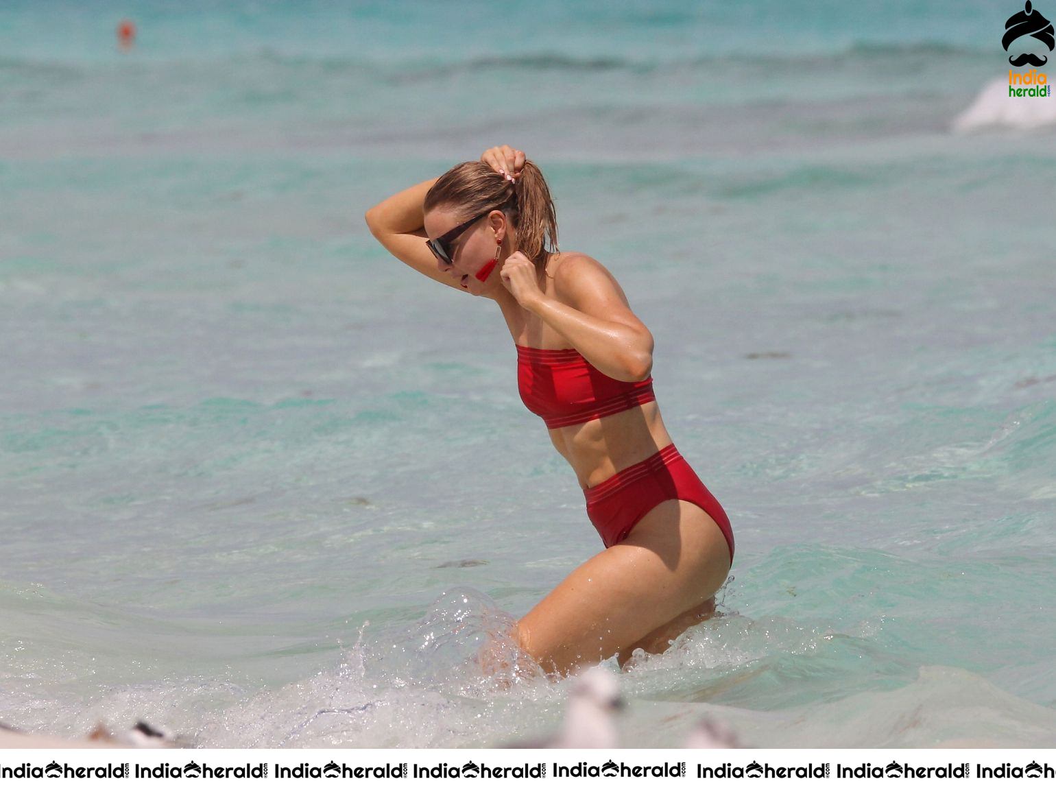 Grace Levy in a two piece red bikini while in Tulum Mexico