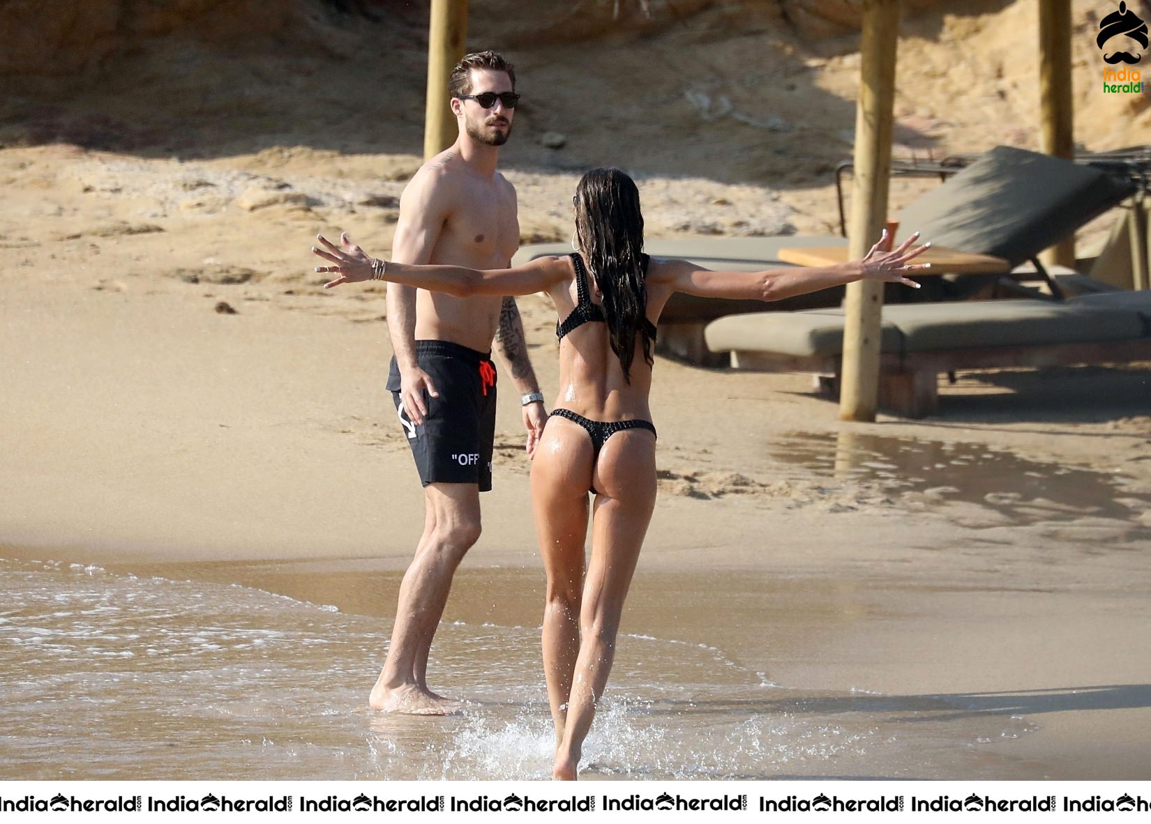 Izabel Goulart in Black String Bikini enjoying with Boyfriend on the beach in Mykonos Set 1