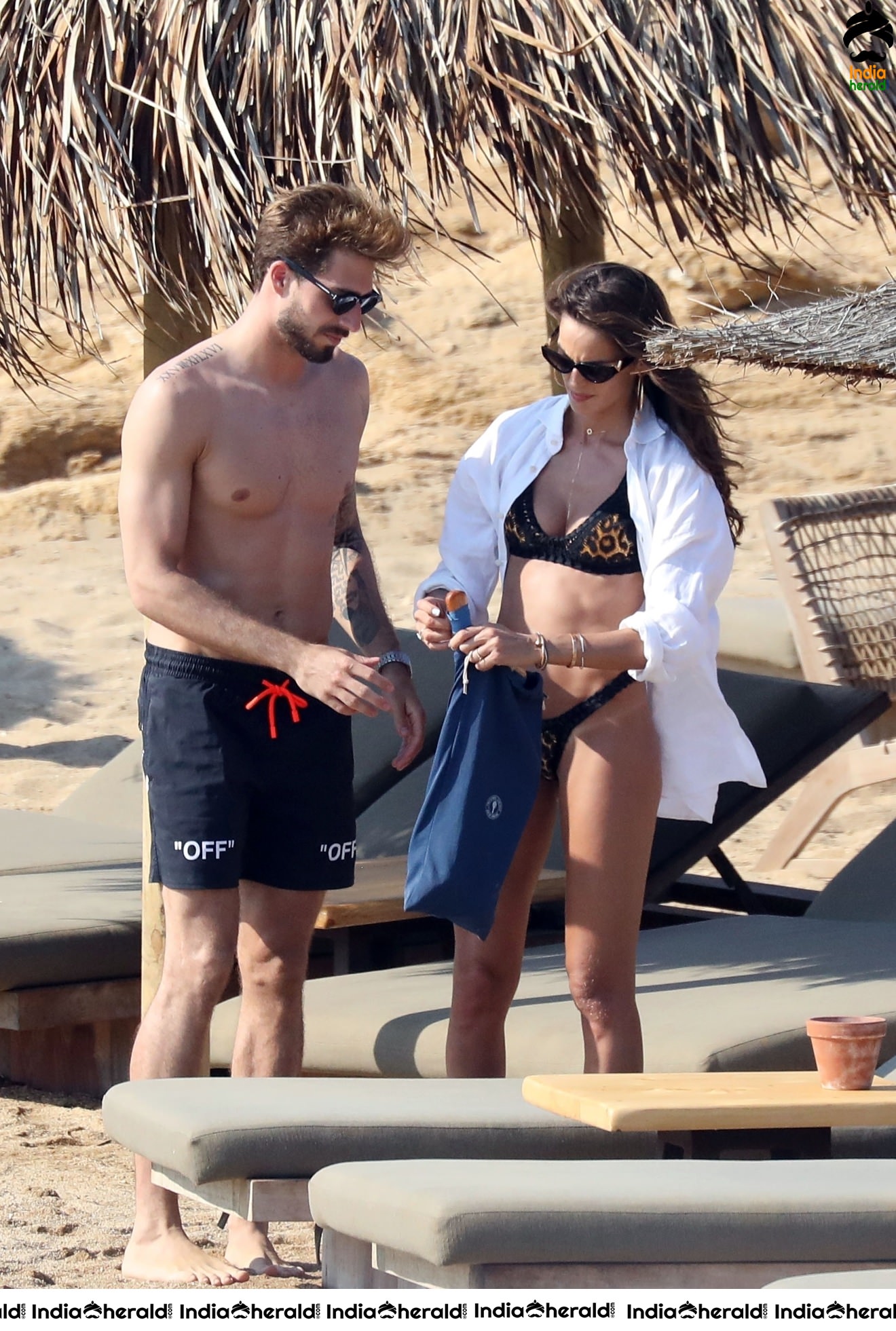 Izabel Goulart in Black String Bikini enjoying with Boyfriend on the beach in Mykonos Set 2