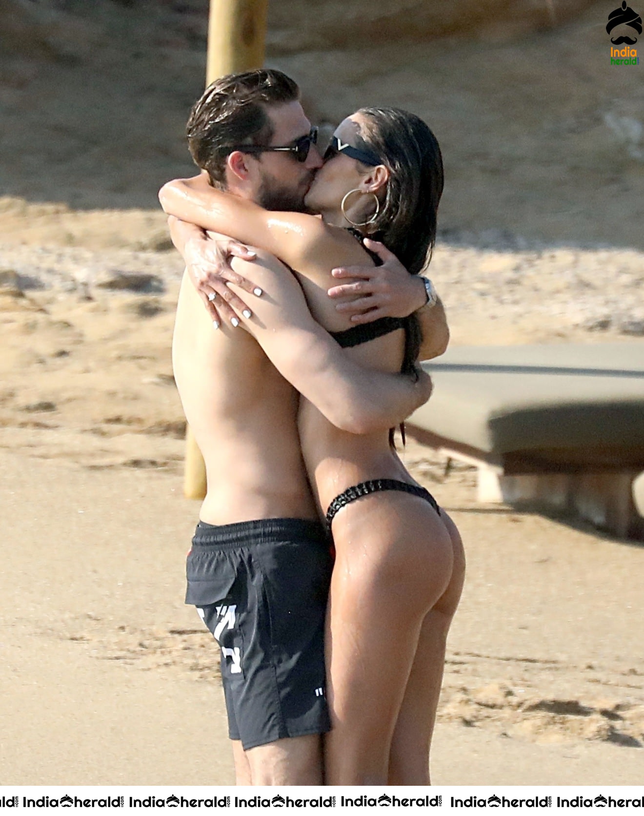 Izabel Goulart in Black String Bikini enjoying with Boyfriend on the beach in Mykonos Set 2