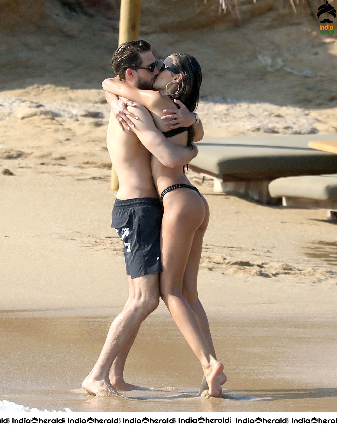 Izabel Goulart in Black String Bikini enjoying with Boyfriend on the beach in Mykonos Set 2
