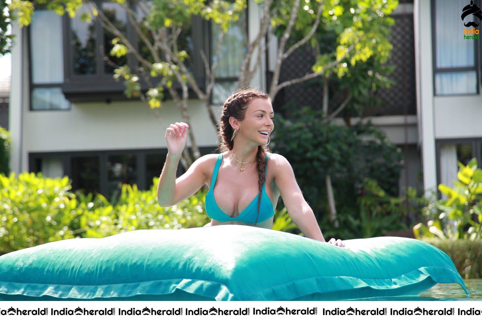 Kady McDermott flaunts her sexy assets by poolside at the Baba Beach Club in Phuket