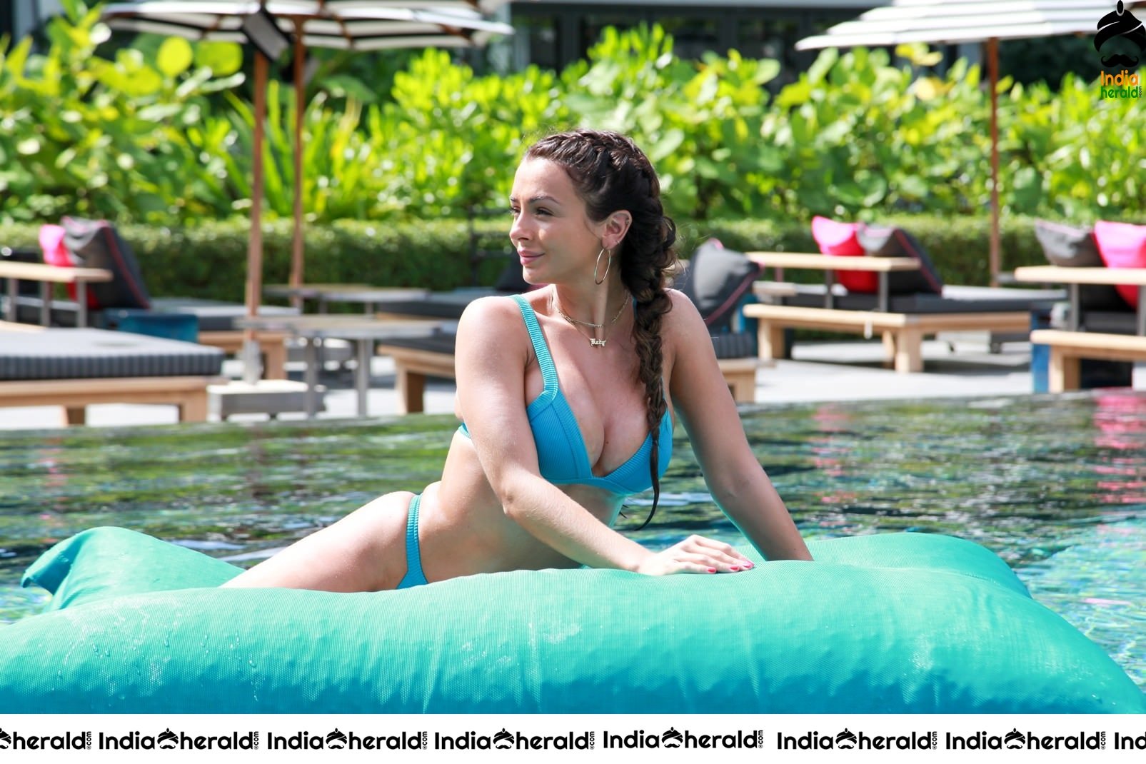 Kady McDermott flaunts her sexy assets by poolside at the Baba Beach Club in Phuket