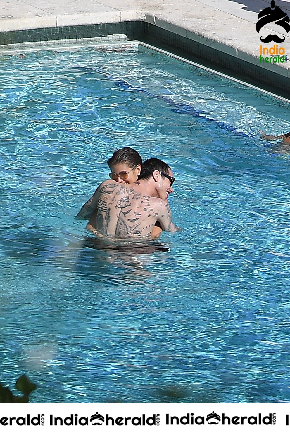 Kaia Gerber in a Black Bikini at a Pool in Miami Set 2