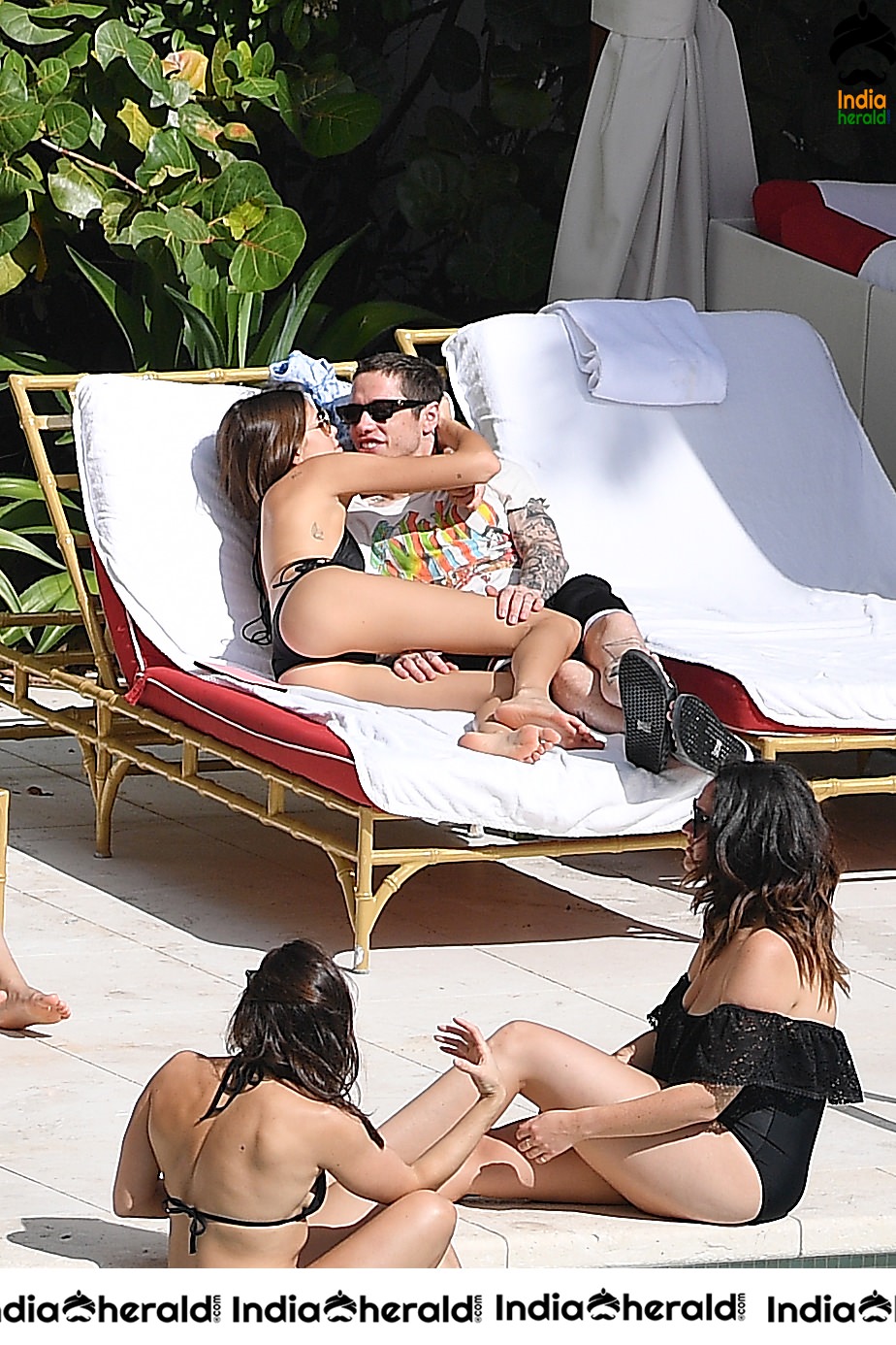 Kaia Gerber in a Black Bikini at a Pool in Miami