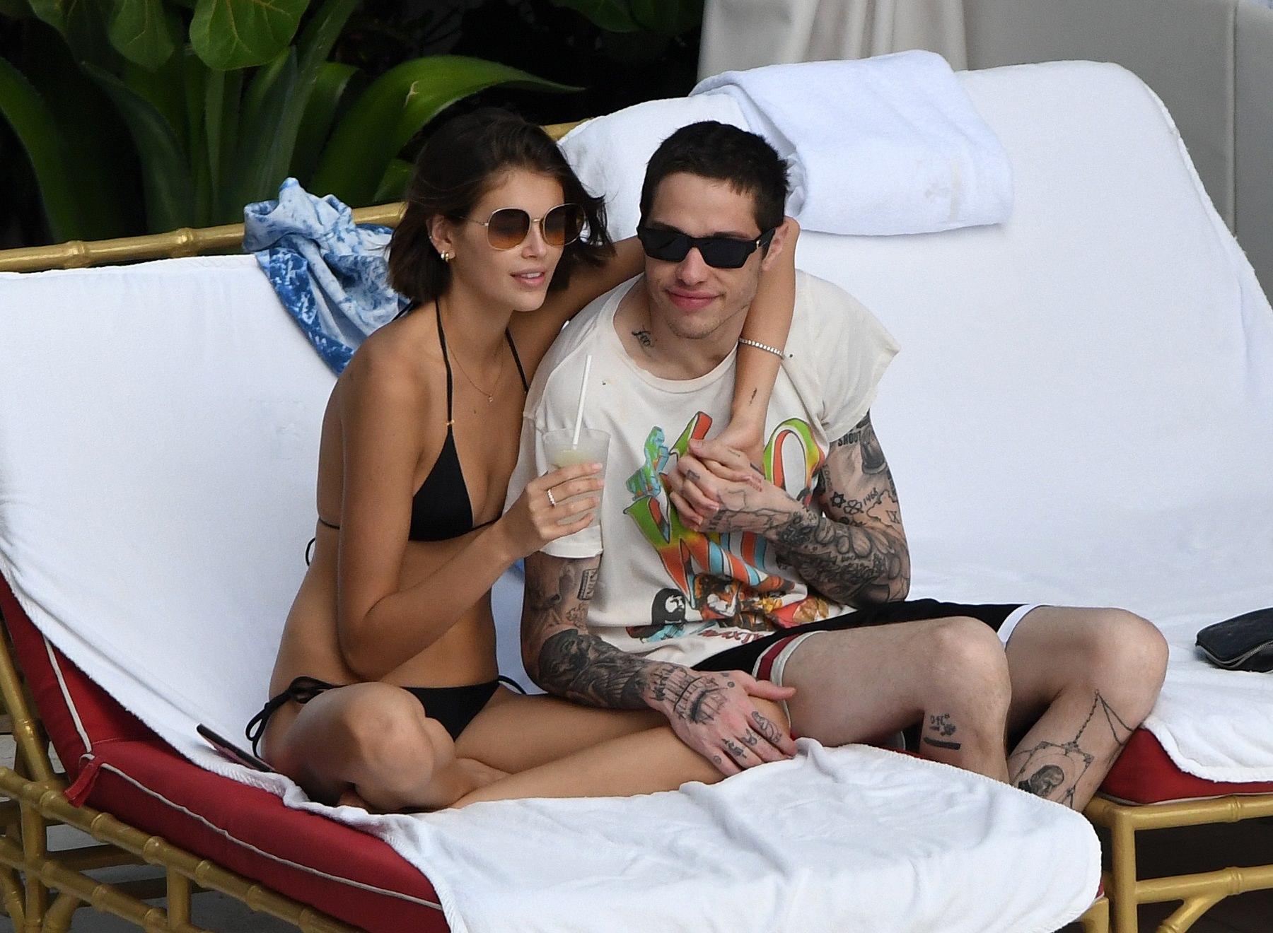 Kaia Gerber in a Black Lace Bikini by Poolside and Enjoys with Boyfriend Set 1