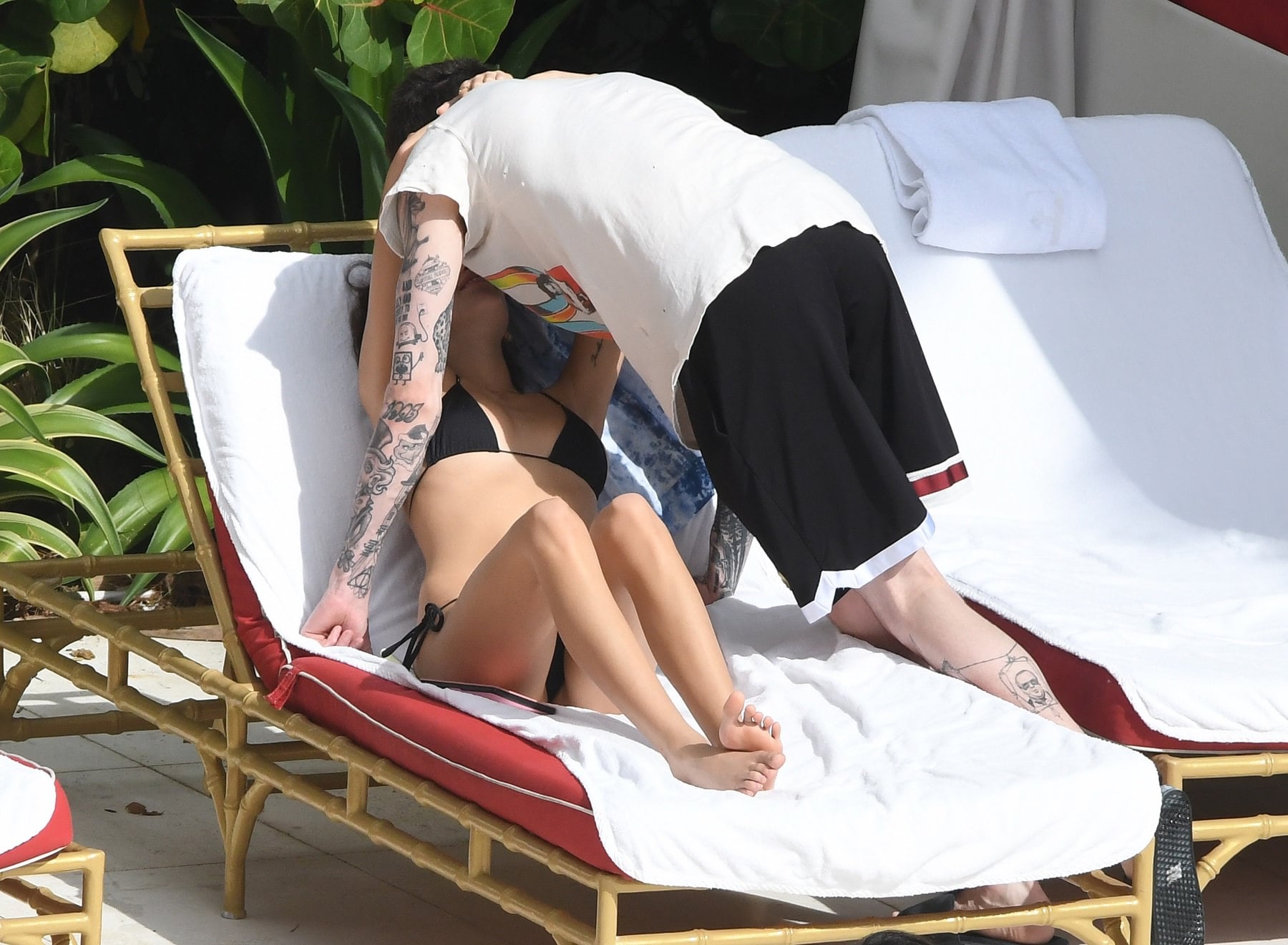 Kaia Gerber in a Black Lace Bikini by Poolside and Enjoys with Boyfriend Set 2