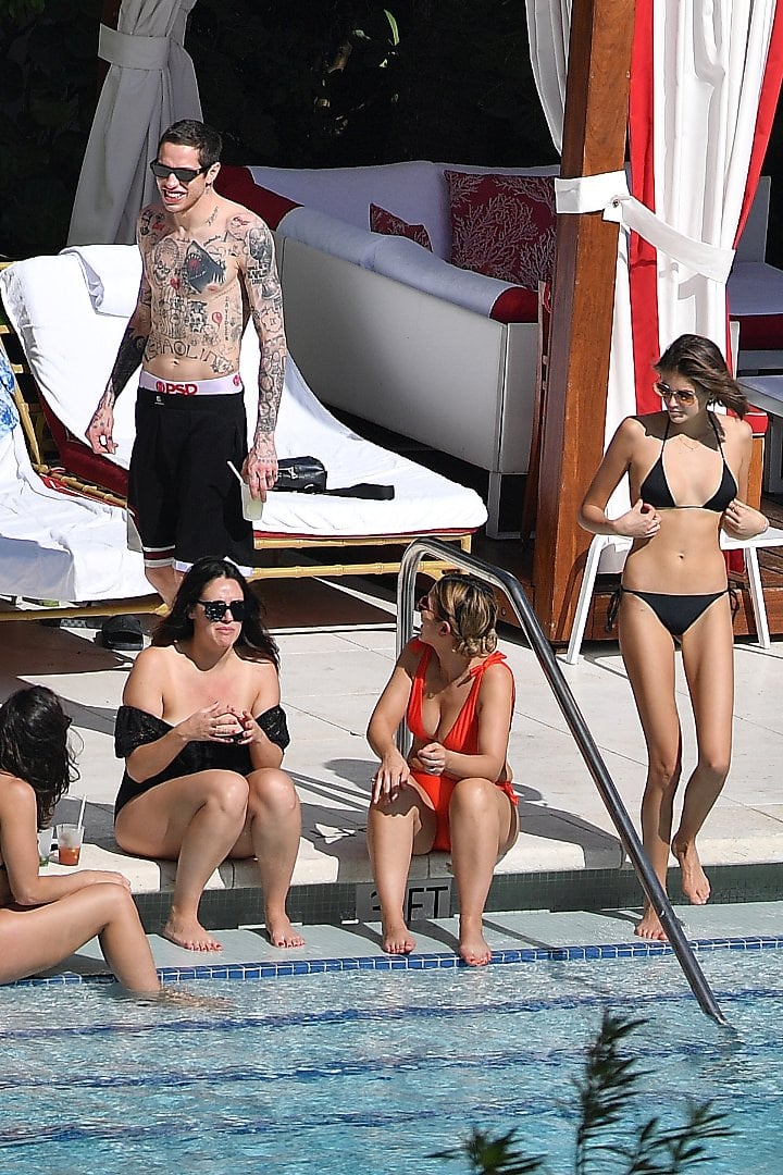 Kaia Gerber in a Black Lace Bikini by Poolside and Enjoys with Boyfriend Set 2