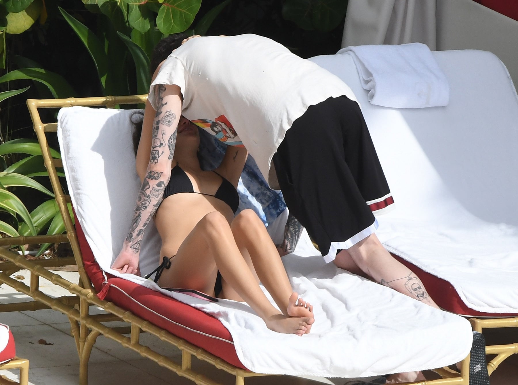 Kaia Gerber in a Black Lace Bikini by Poolside and Enjoys with Boyfriend Set 2