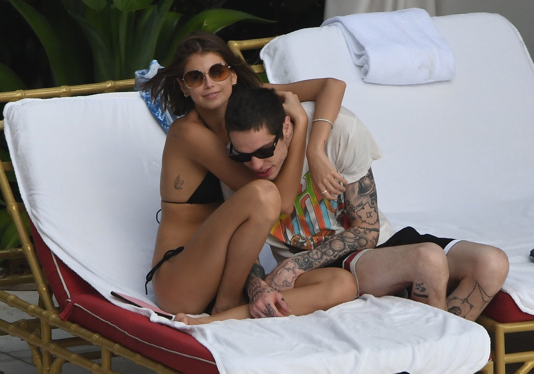 Kaia Gerber in a Black Lace Bikini by Poolside and Enjoys with Boyfriend Set 2