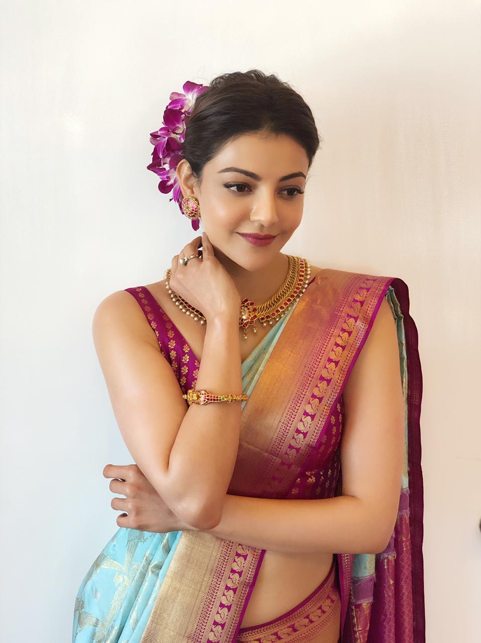 Kajal Aggarwal Hot Hip and Navel Show in Saree