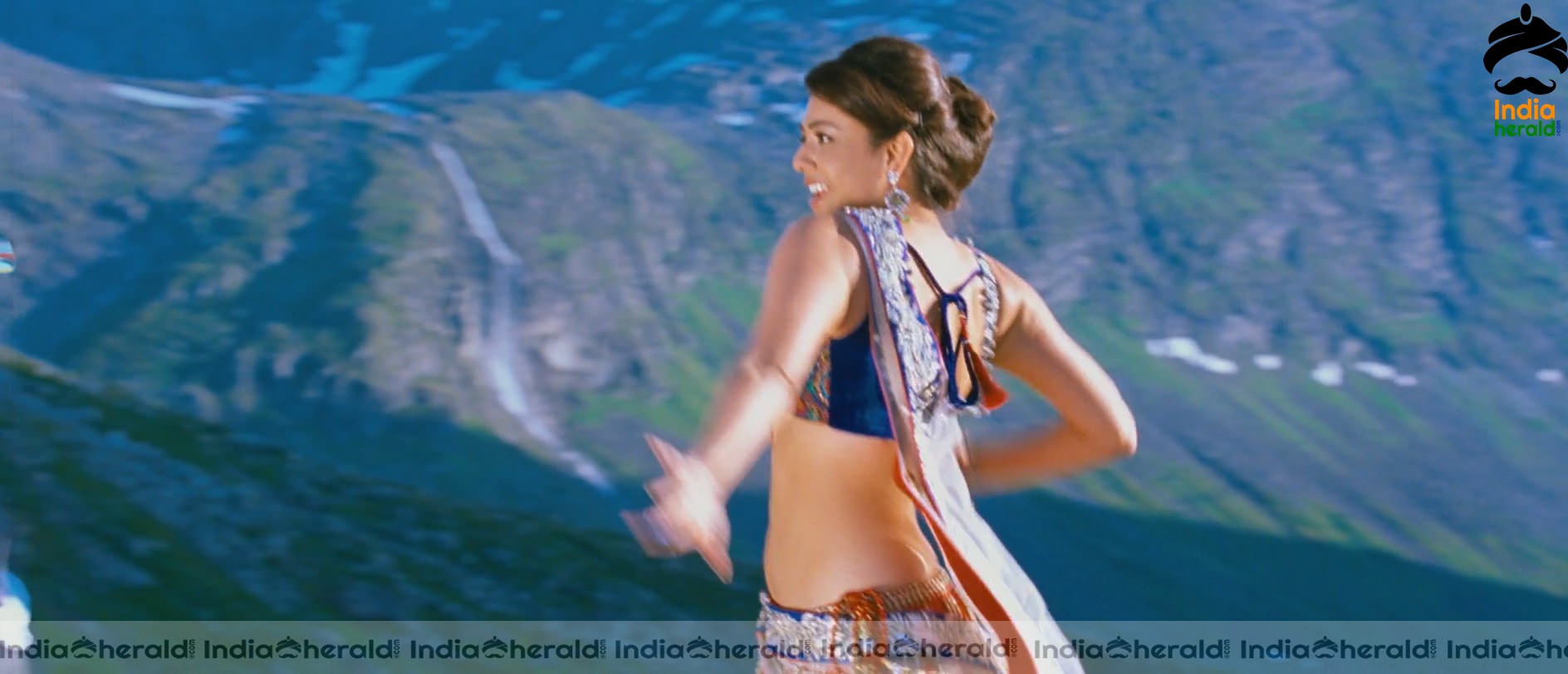 Kajal Aggarwal Showing Her Hot Midriff and Cleavage in a Sexy Exposing Lehenga Sequence Set 3