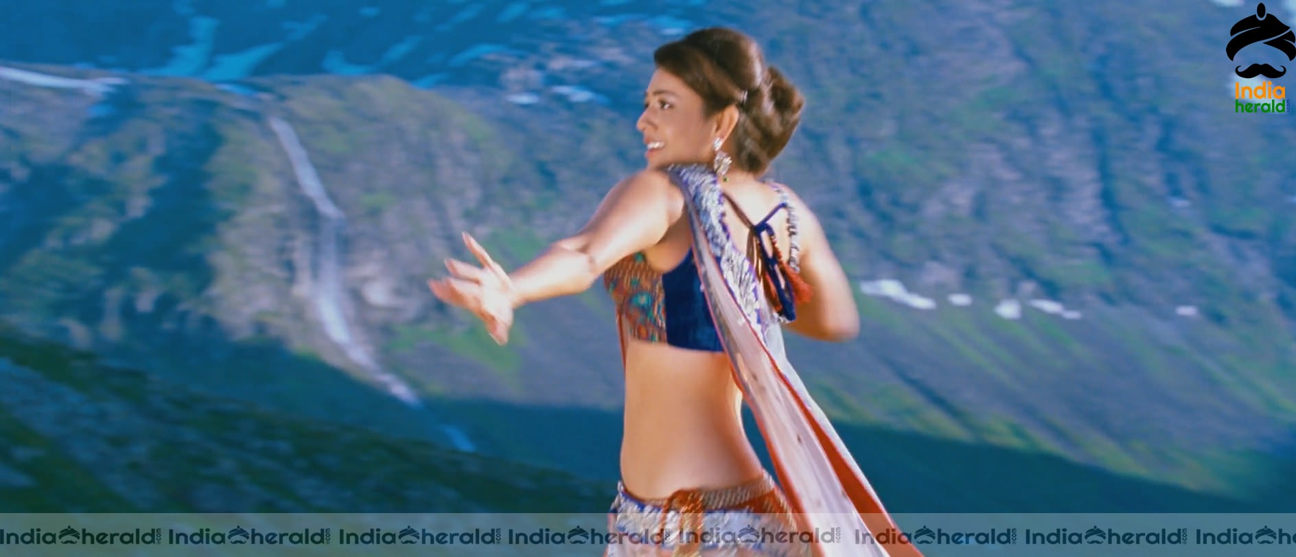 Kajal Aggarwal Showing Her Hot Midriff and Cleavage in a Sexy Exposing Lehenga Sequence Set 3