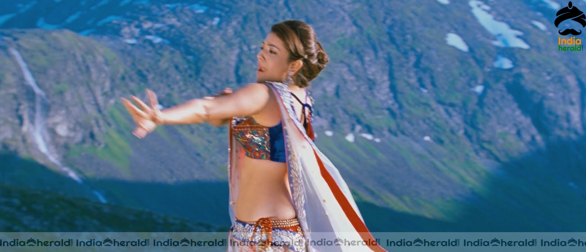 Kajal Aggarwal Showing Her Hot Midriff and Cleavage in a Sexy Exposing Lehenga Sequence Set 3