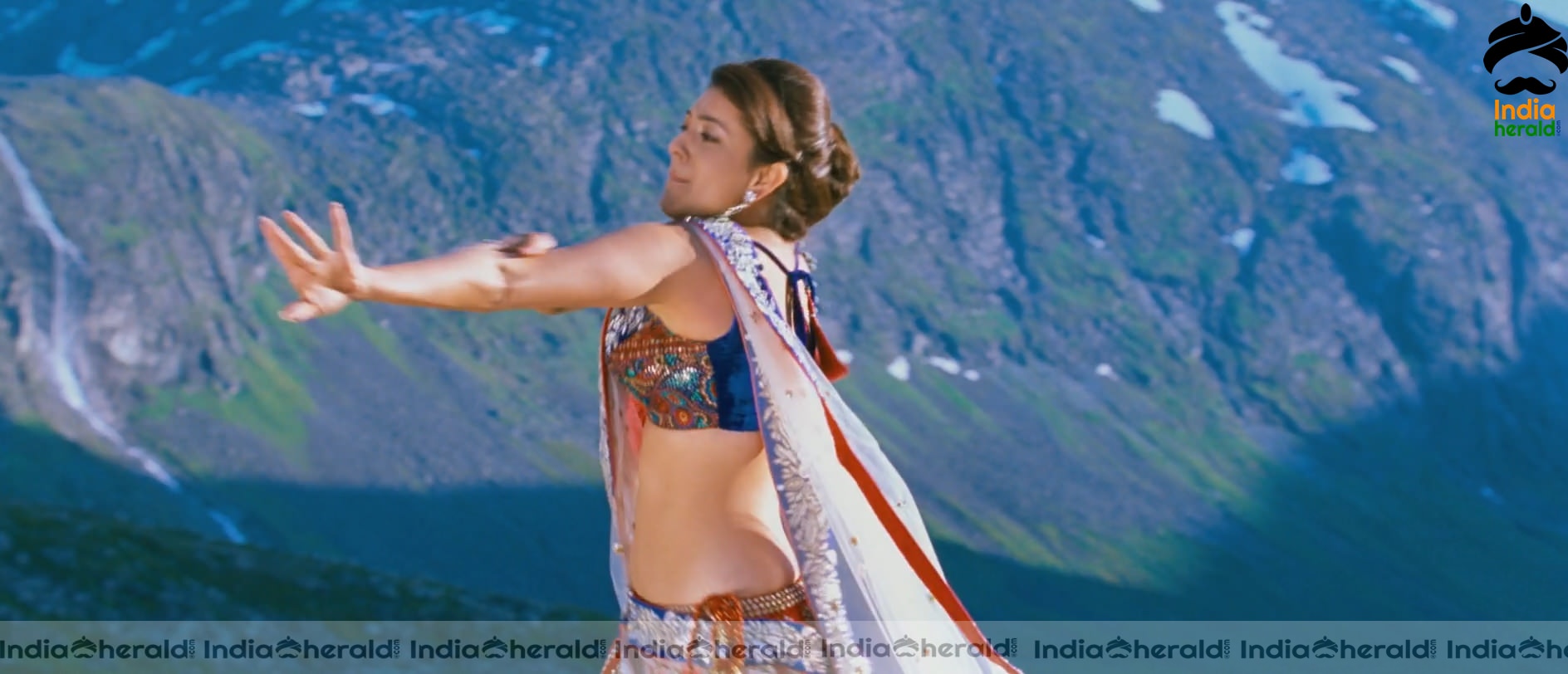 Kajal Aggarwal Showing Her Hot Midriff and Cleavage in a Sexy Exposing Lehenga Sequence Set 3
