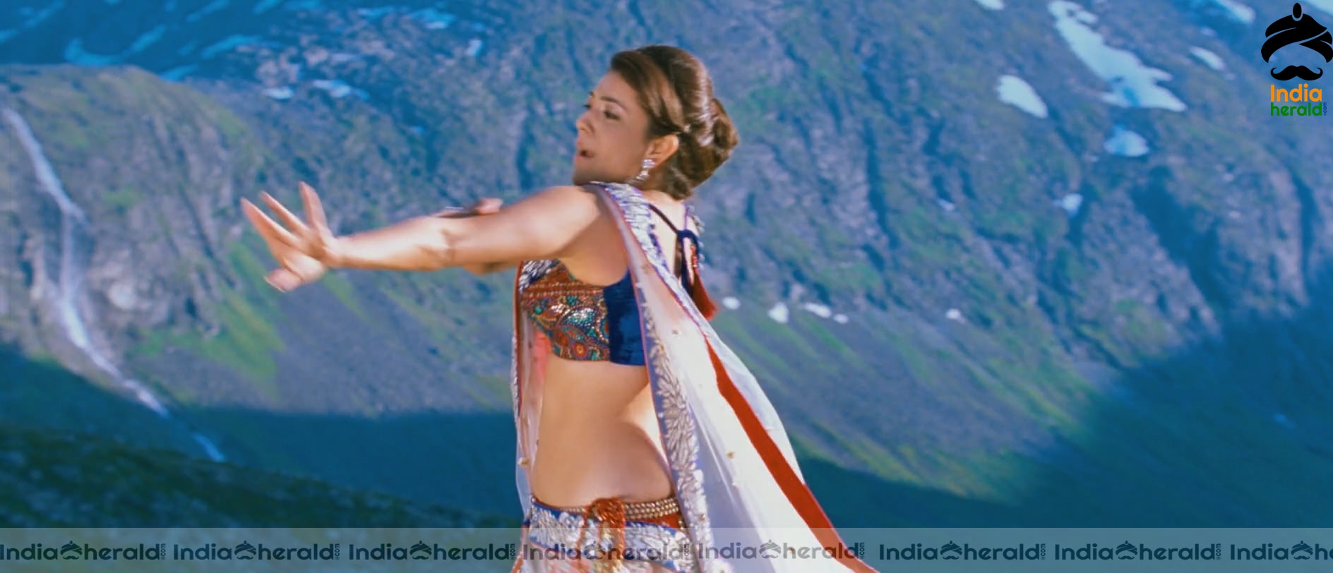 Kajal Aggarwal Showing Her Hot Midriff and Cleavage in a Sexy Exposing Lehenga Sequence Set 3