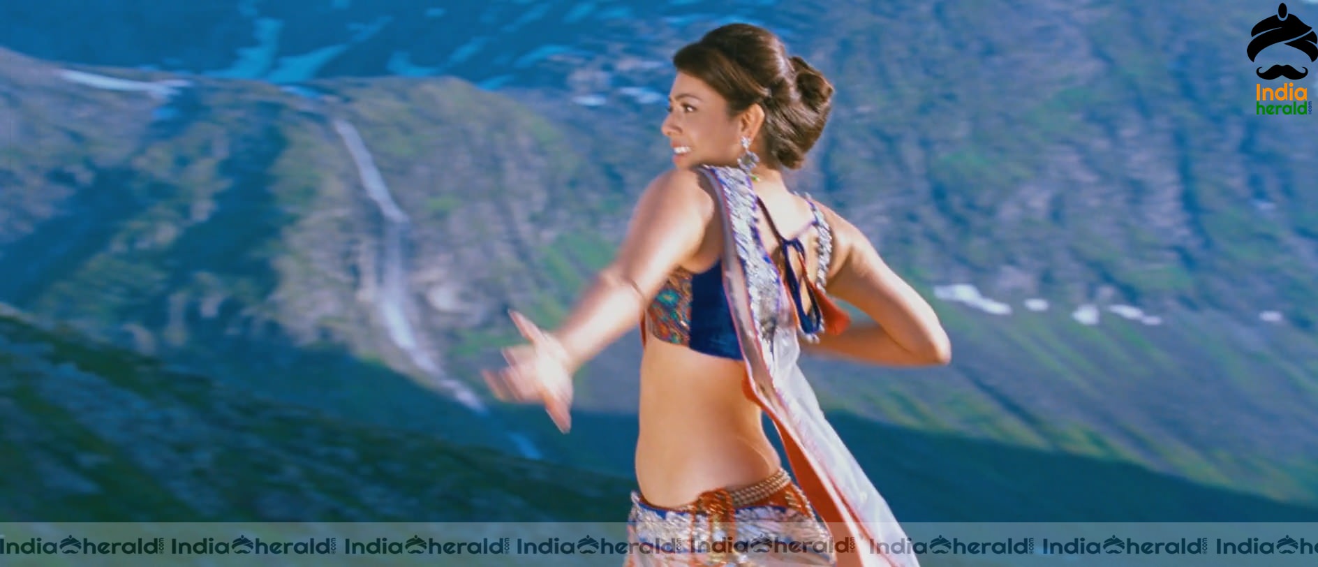 Kajal Aggarwal Showing Her Hot Midriff and Cleavage in a Sexy Exposing Lehenga Sequence Set 3