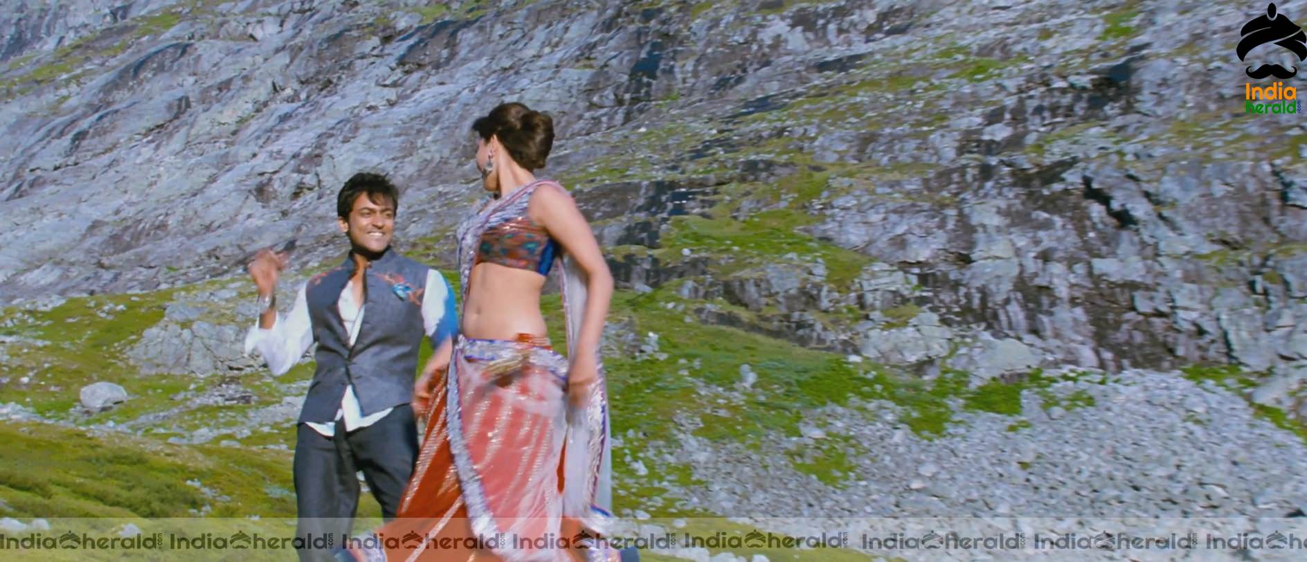 Kajal Aggarwal Showing Her Hot Midriff and Cleavage in a Sexy Exposing Lehenga Sequence Set 4