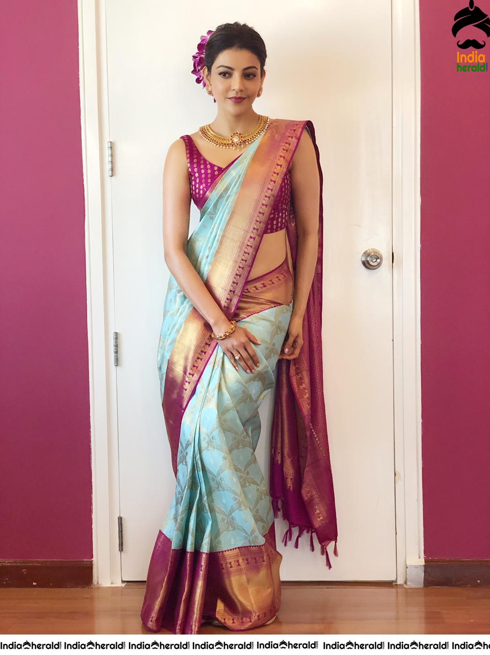 Kajal Aggarwal Showing her Sexy Hot Hip in Sleeveless Blouse and Saree