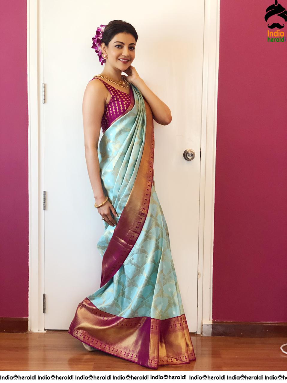 Kajal Aggarwal Showing her Sexy Hot Hip in Sleeveless Blouse and Saree