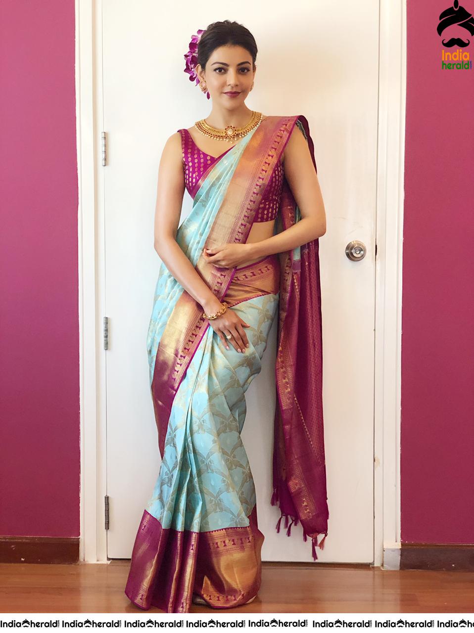 Kajal Aggarwal Showing her Sexy Hot Hip in Sleeveless Blouse and Saree