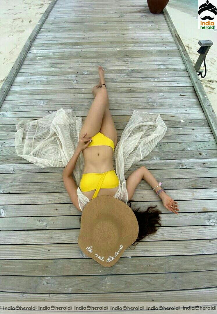 Karishma Tanna Hot Yellow Bikini Stills