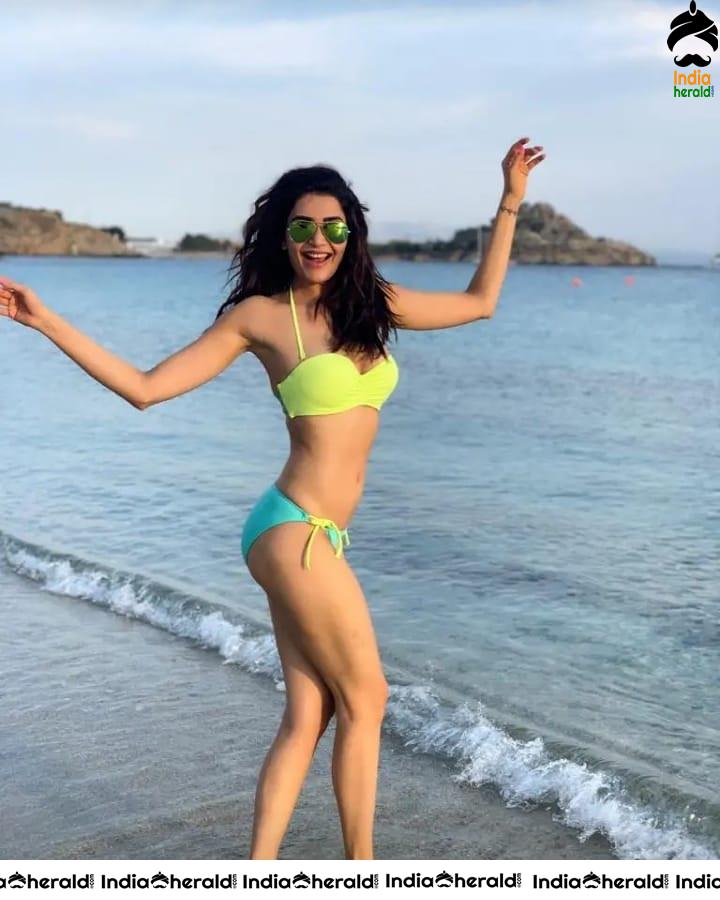 Karishma Tanna shows her Hot Body and Booty in these Bikini Photos