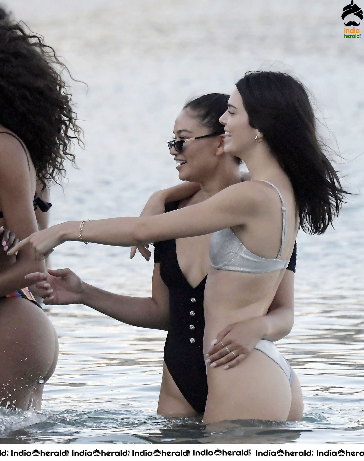 Kendall Jenner in a Bikini and flaunts her slim body and peeping assets at a Beach in Mykonos