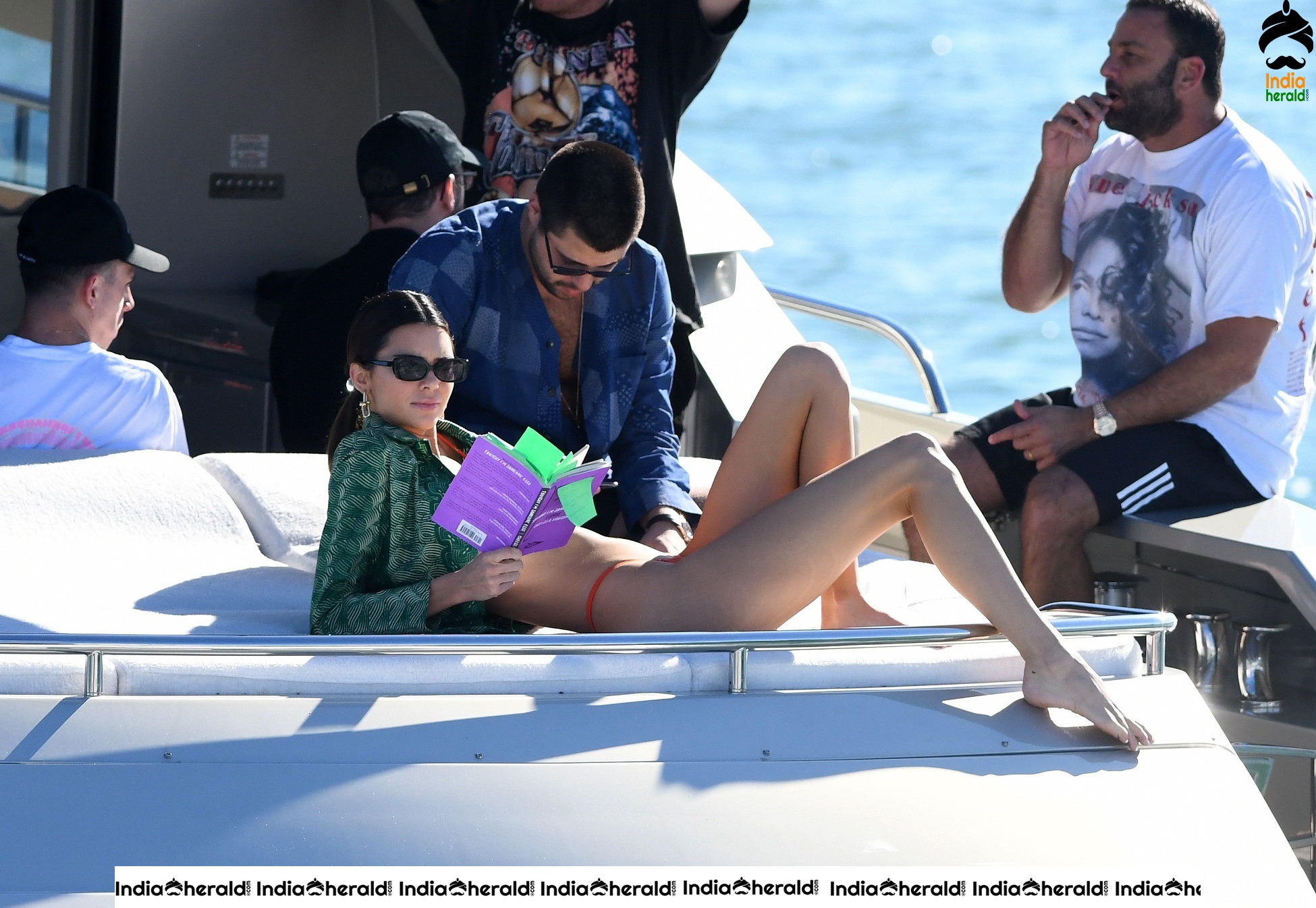 Kendall Jenner in Orange Bikini on a Yacht in Miami Set 1