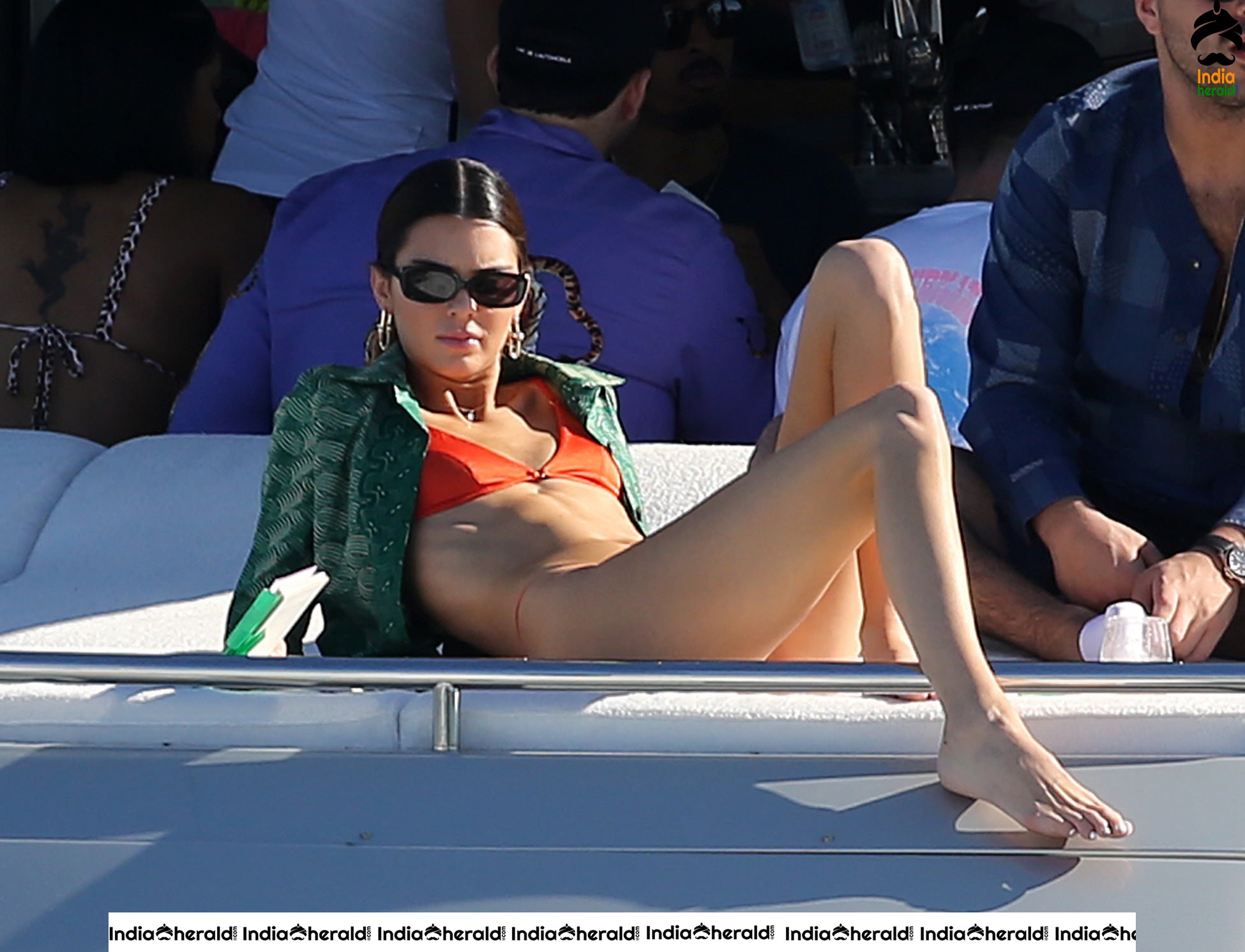 Kendall Jenner in Orange Bikini on a Yacht in Miami Set 1