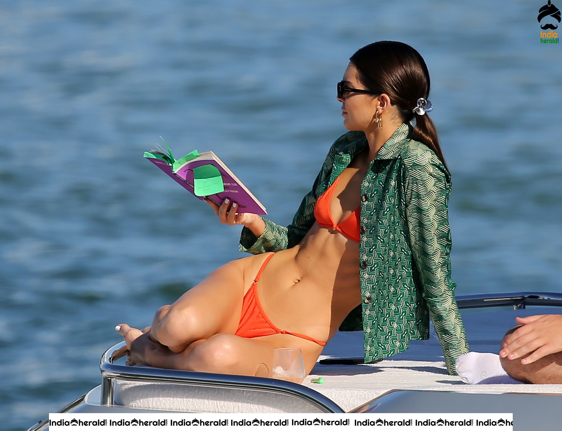 Kendall Jenner in Orange Bikini on a Yacht in Miami Set 1